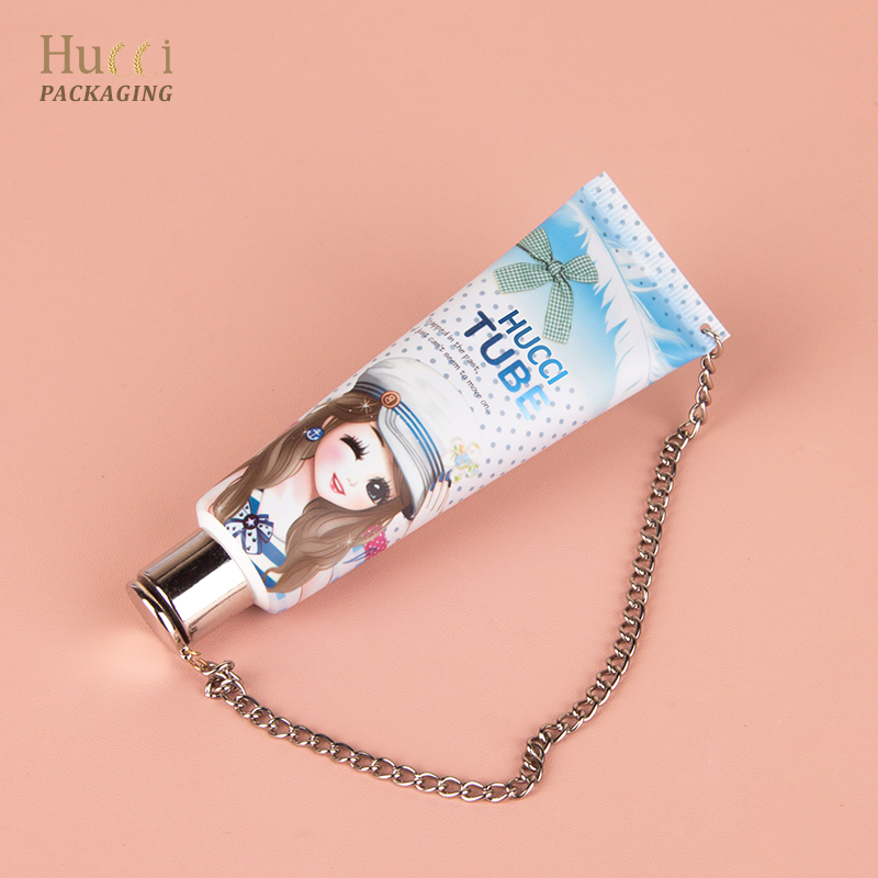 cosmetic tube with key chain}