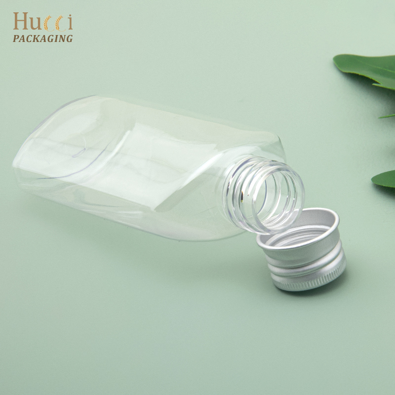 Cosmetic bottle with aluminum cap}